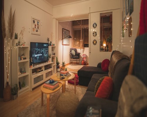 A warmly lit evening setup in a cozy living room